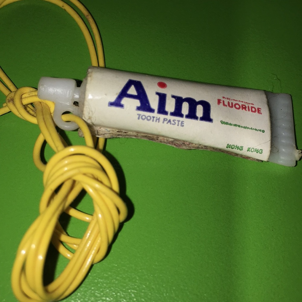 1980s 1.5” mini AIM toothpaste tube child necklace 80s HONG KONG dentist toy